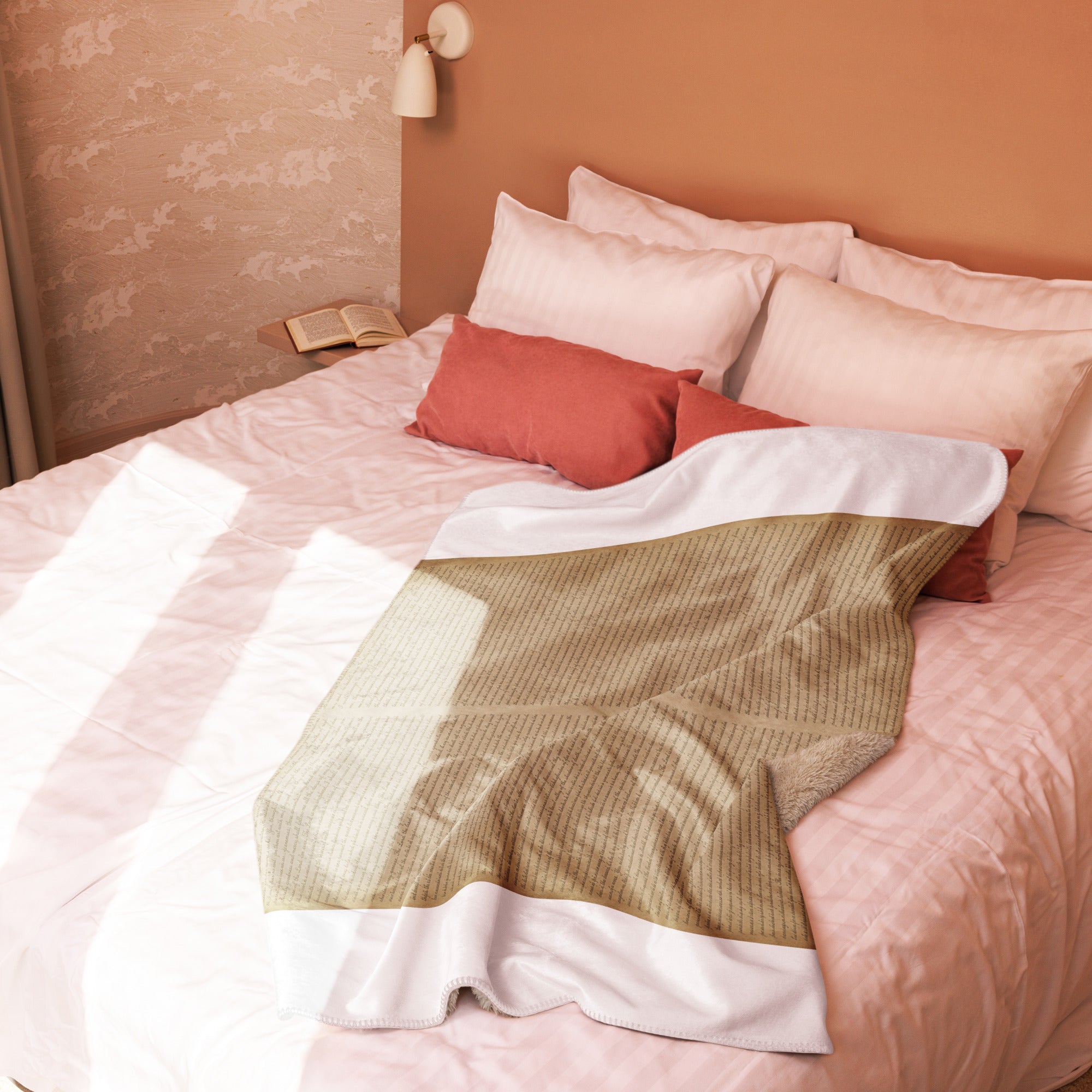 Luxury Sherpa Throw Blanket — Signature Edition in beige tones displayed on a neatly made bed with soft pink bedding and complementary coral accent pillows in a warm, elegant bedroom setting.